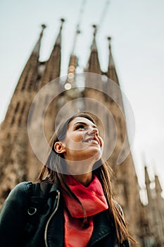 Smiling spanish woman visiting famous landmarks and attractions in center of Barcelona,Catalonia,Spain.Travel experience.