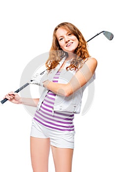 Smiling sportswoman with golf club on white