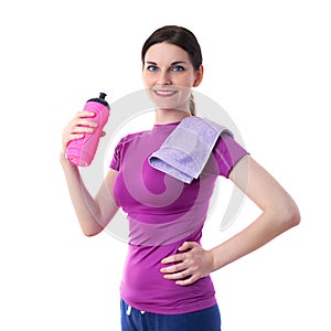 Smiling sporty woman in violet T-short over white isolated background