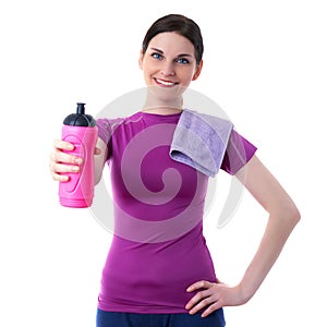 Smiling sporty woman in violet T-short over white isolated background