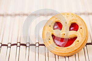 smiling strawberry jam cookies. Close up