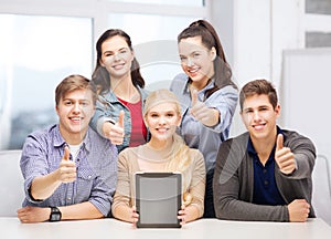 Smiling students with blank tablet pc screen