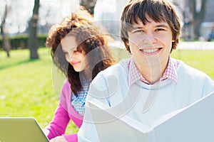 Smiling students outdoors