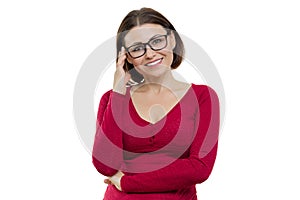 Smiling successful confident middle-aged woman in glasses looking at camera on white background, isolated