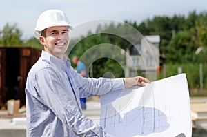 Smiling successful young architect