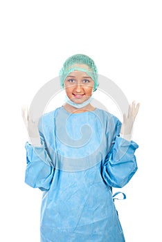 Smiling surgeon showing hands in gloves