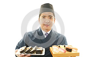 Smiling sushi chef