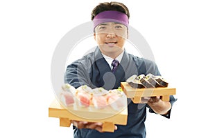 Smiling sushi chef