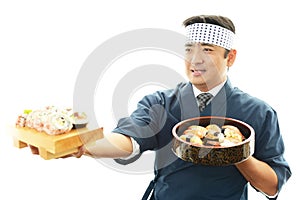 Smiling sushi chef
