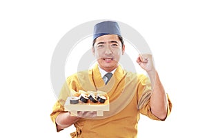 Smiling sushi chef