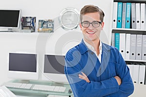 Smiling technician looking at camera