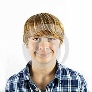 Smiling teen boy in studio