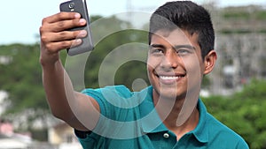 Smiling Teen Boy Taking Selfy