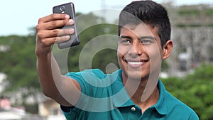 Smiling Teen Boy Taking Selfy