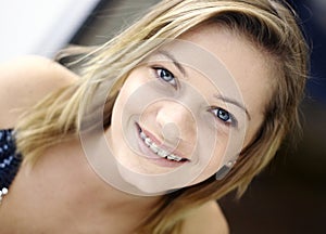 Smiling teen with braces