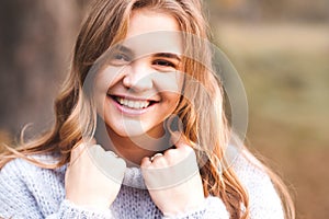 Smiling teen girl outdoors