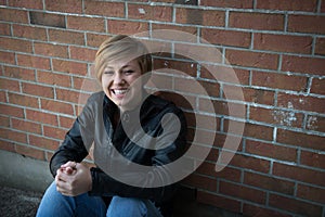 Smiling teen girl outside school