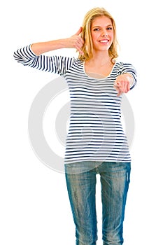 Smiling teen girl showing contact me gesture