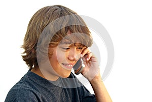 Smiling teenage Boy Talking on Mobile Phone