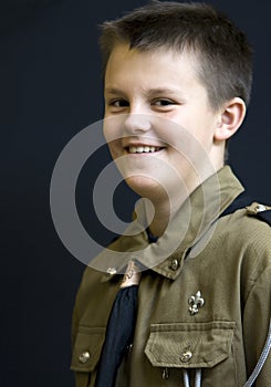 Smiling teenage boyscout