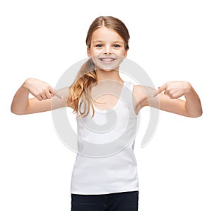 Smiling teenage girl in blank white shirt