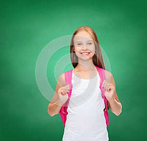 Smiling teenage girl in blank white tank top