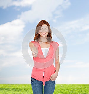 Smiling teenage girl in casual clothes