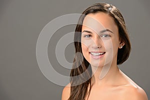 Smiling teenage girl skin care beauty portrait