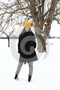 Smiling teenage girl on snow