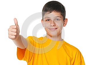 Smiling teenager demonstrates thumb up