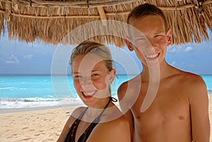 Smiling teens at the beach