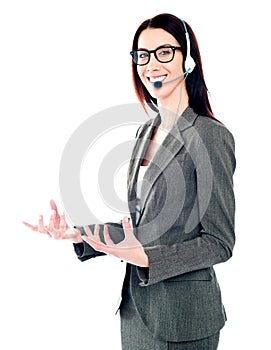 Smiling telemarketing girl posing in headsets