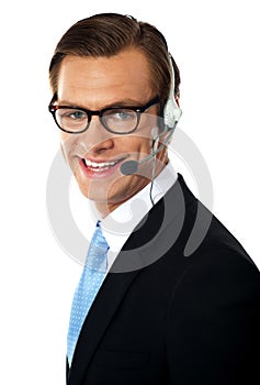 Smiling telemarketing male executive, closeup shot