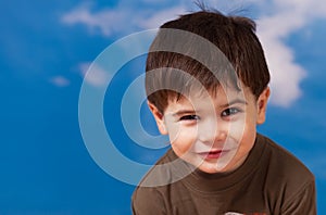 Smiling three year old boy