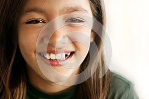 Smiling toothless young girl