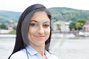 Smiling turkish woman outside