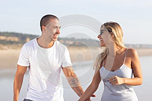 Smiling wife and husband during honeymoon