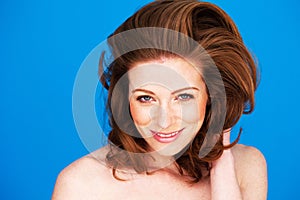 Smiling Woman With Auburn Hair