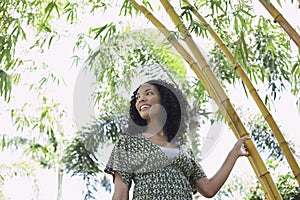Smiling Woman In Bamboo Forest