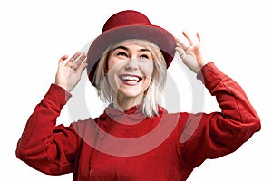 Smiling woman. Beautifu youngl woman wearing red hat and in a red sweatshirt