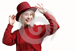 Smiling woman. Beautifu youngl woman wearing red hat and in a red sweatshirt