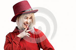 Smiling woman. Beautifu youngl woman wearing red hat and in a red sweatshirt