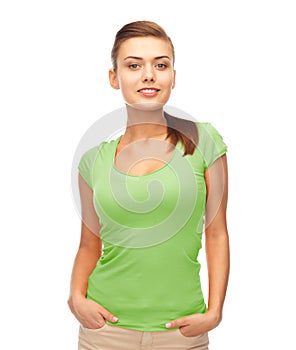 Smiling woman in blank green t-shirt