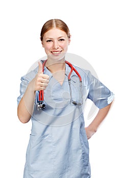 Smiling woman in blue doctor's smock with red stethoscope
