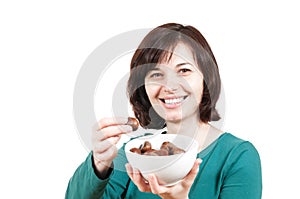 Smiling woman with bowl of chestnuts