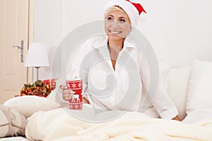 Smiling woman in christmas time.