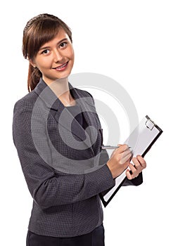 Smiling woman with clipboard isolated
