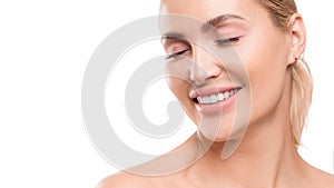 Smiling woman with closed eyes. Dental and spa concept. Skincare. Isolated on white background.