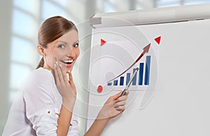 Smiling woman and color chart, office background