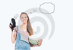 Smiling woman cooking on empty white background